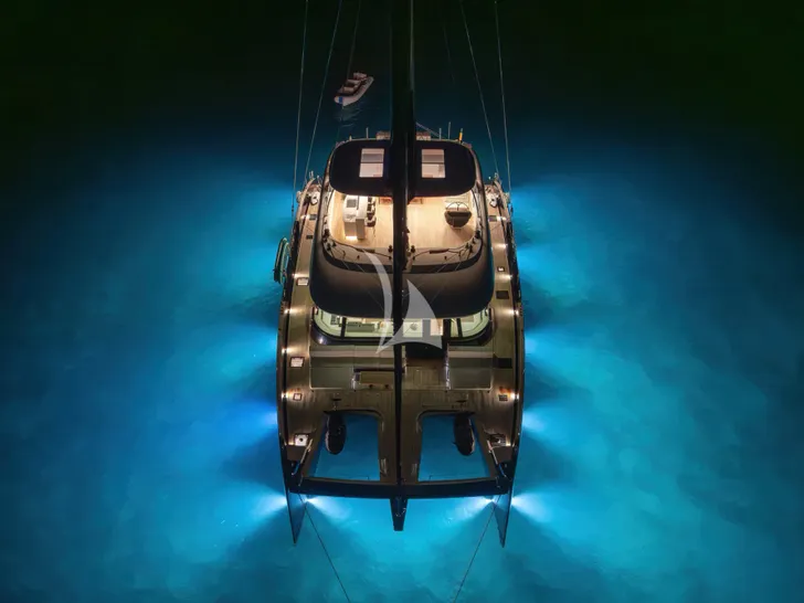 BELLDIA Sunreef 80 - anchored bow view at night BELLDIA Sunreef 80 - anchored bow view at night