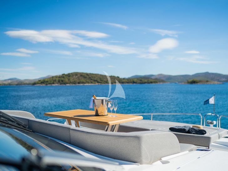 BLACK MAMBA Sunseeker 86 Yacht - wine party on the bow BLACK MAMBA Sunseeker 86 Yacht - wine party on the bow