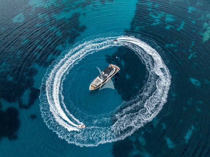 BLUE INFINITY ONE Sunseeker 95 Yacht aerial shot with waterline