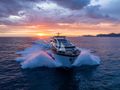 BLUE INFINITY ONE Sunseeker 95 Yacht cruising under the sunset