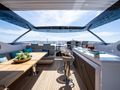 BLUE INFINITY ONE Sunseeker 95 Yacht flybridge dining and bar area BLUE INFINITY ONE Sunseeker 95 Yacht flybridge dining and bar area