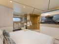BLUE EYES Azimut Magellano 25M - master cabin bed and TV BLUE EYES Azimut Magellano 25M - master cabin bed and TV