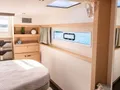 BLUE ONE Fountaine Pajot Aura 51 - master cabin bed and view BLUE ONE Fountaine Pajot Aura 51 - master cabin bed and view