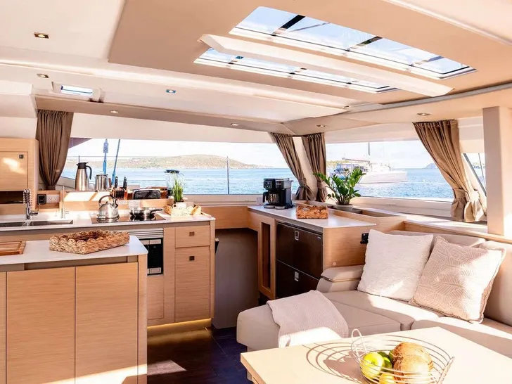 BLUE ONE Fountaine Pajot Aura 51 - saloon and galley BLUE ONE Fountaine Pajot Aura 51 - saloon and galley