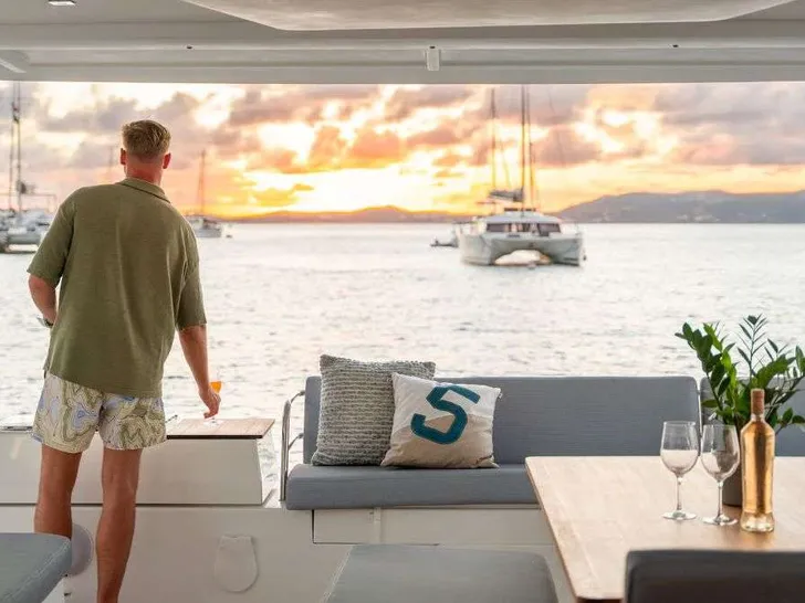 BLUE ONE Fountaine Pajot Aura 51 - sunset watching on the aft deck BLUE ONE Fountaine Pajot Aura 51 - sunset watching on the aft deck