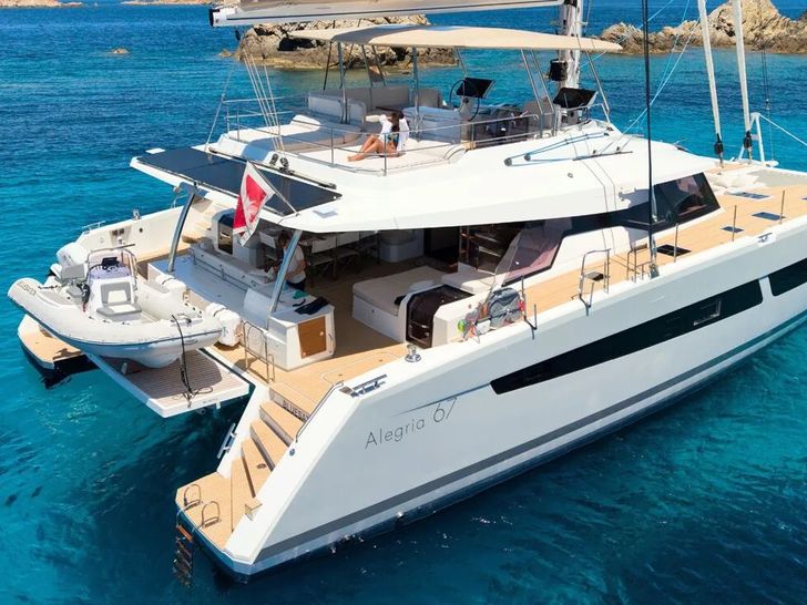 BLUESATION Fountaine Pajot Alegria 67 - anchored side shot BLUESATION Fountaine Pajot Alegria 67 - anchored side shot