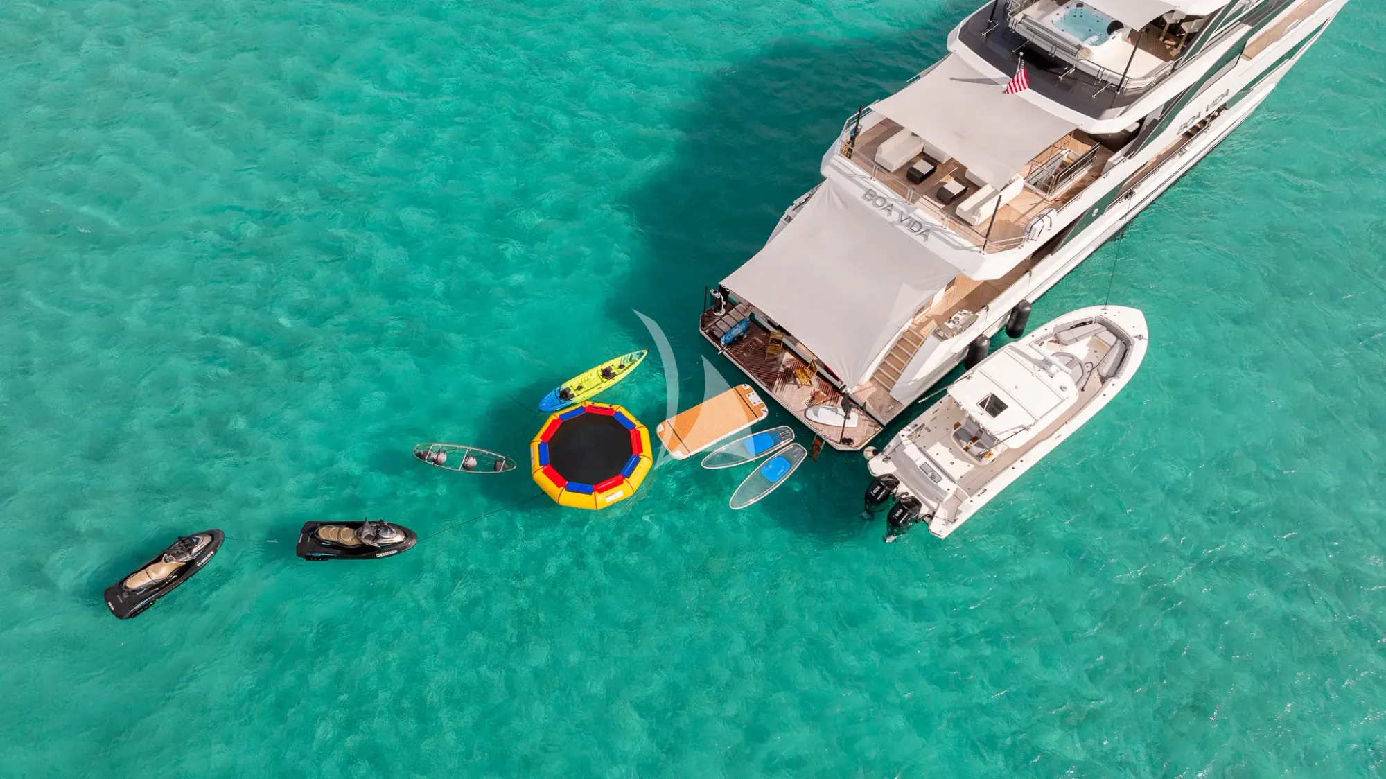 BOA VIDA Ocean Alexander 35R - anchored aft shot with the water toys