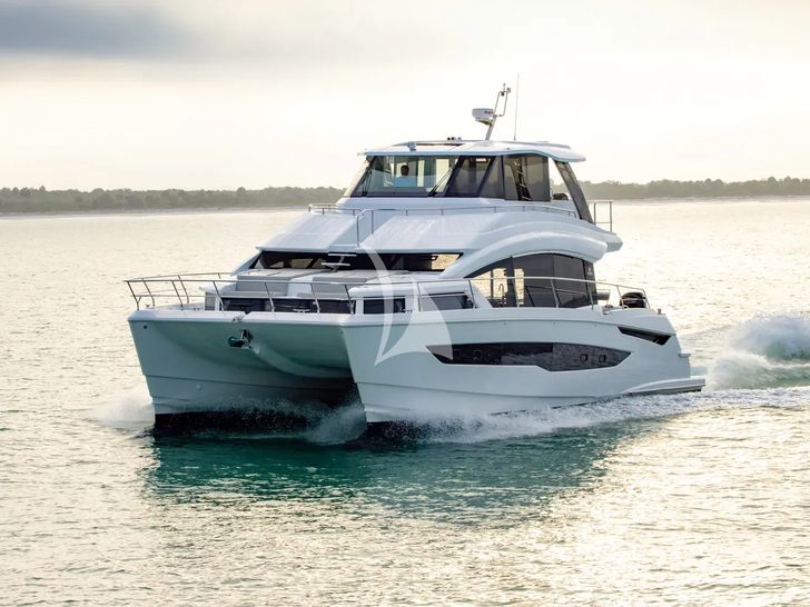 BOLUBO II Aquila 54 Power Catamaran - cruising front view BOLUBO II Aquila 54 Power Catamaran - cruising front view