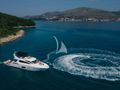 CARDANO Sunseeker Manhattan 63 - anchored with the jet ski CARDANO Sunseeker Manhattan 63 - anchored with the jet ski