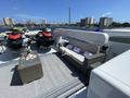 CLAIRE Hatteras 100 - sundeck with the jet skis CLAIRE Hatteras 100 - sundeck with the jet skis