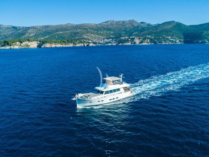 CLOUD 9 Sasga Menorquin 68 Flybridge - aerial shot cruising CLOUD 9 Sasga Menorquin 68 Flybridge - aerial shot cruising