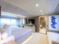 COFINA Benetti Classic Supreme 132 - master cabin bed and TV COFINA Benetti Classic Supreme 132 - master cabin bed and TV