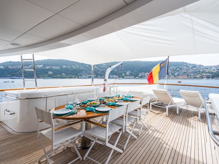 CORNELIA RMK Marine 34m - sundeck alfresco dining set up CORNELIA RMK Marine 34m - sundeck alfresco dining set up