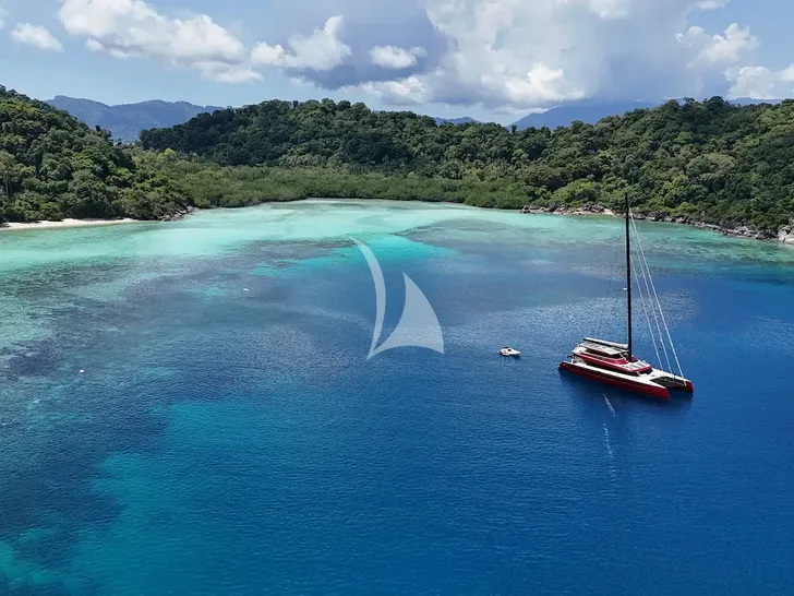 CRAZY LOVE Hudson HH88 - drone shot anchored near an island CRAZY LOVE Hudson HH88 - drone shot anchored near an island