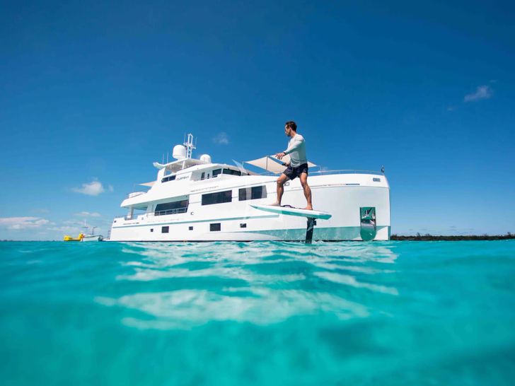 CURFEW II Mengi Yay Serenitas 31m - anchored with the e-Foil in the view CURFEW II Mengi Yay Serenitas 31m - anchored with the e-Foil in the view