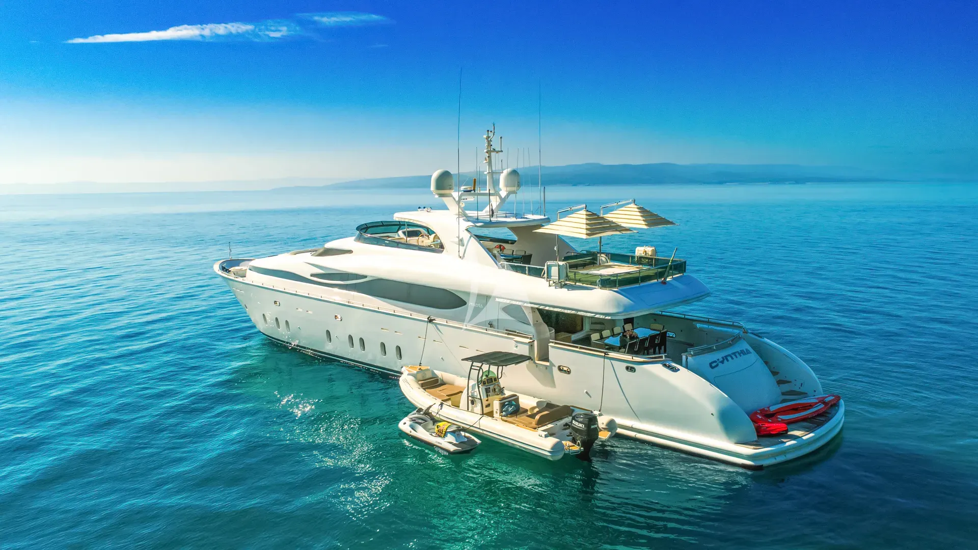 CYNTHIA Maiora 35 DP - anchored with the tender