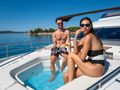 DALIA Dominator 780S - guests in the foredeck jacuzzi DALIA Dominator 780S - guests in the foredeck jacuzzi