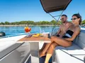 DALIA Dominator 780S - guests lounging on the foredeck DALIA Dominator 780S - guests lounging on the foredeck