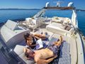 DALIA Dominator 780S - guests sunbathing on the sundeck DALIA Dominator 780S - guests sunbathing on the sundeck