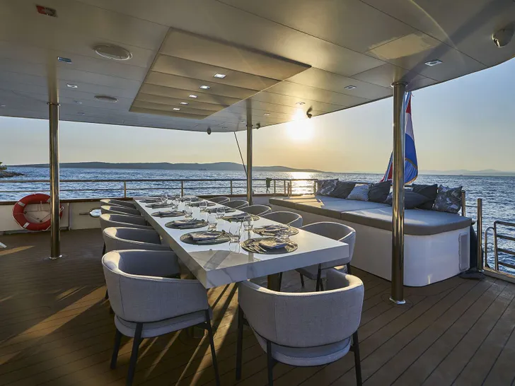 DALMATINO Custom Motor Sailer 43m - aft deck dining area and seating DALMATINO Custom Motor Sailer 43m - aft deck dining area and seating