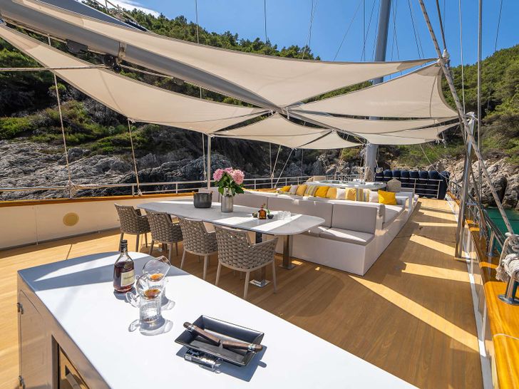 DALMATINO Custom Motor Sailer 43m - sun deck lounge and dining area DALMATINO Custom Motor Sailer 43m - sun deck lounge and dining area