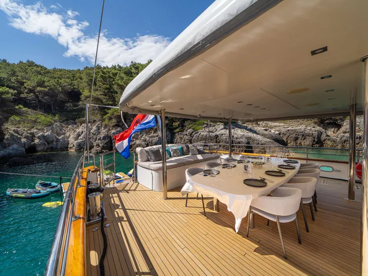 DALMATINO Custom Motor Sailer 43m - upper deck dining area DALMATINO Custom Motor Sailer 43m - upper deck dining area