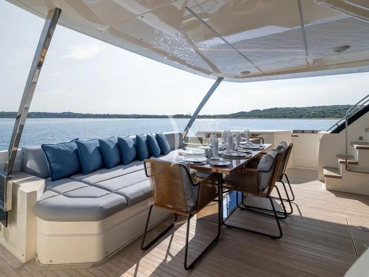 DATE NIGHT Ferretti 920 - aft deck seating and dining area DATE NIGHT Ferretti 920 - aft deck seating and dining area