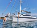 DESTINATION UNKNOWN Privilege Signature 510 - anchored with guests enjoying the Greek waters DESTINATION UNKNOWN Privilege Signature 510 - anchored with guests enjoying the Greek waters