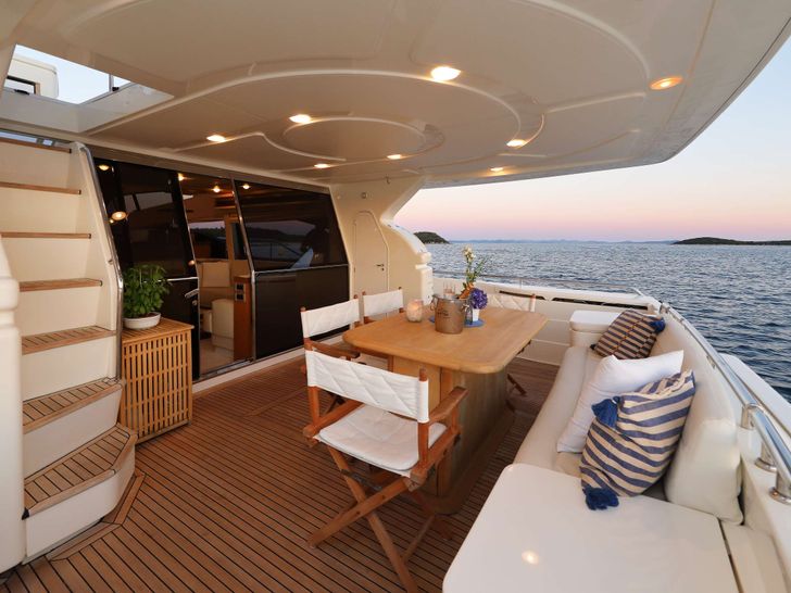 DOMINIQUE Ferretti 681 Crewed Motor Yacht Deck Alfresco Dining DOMINIQUE Ferretti 681 Crewed Motor Yacht Deck Alfresco Dining