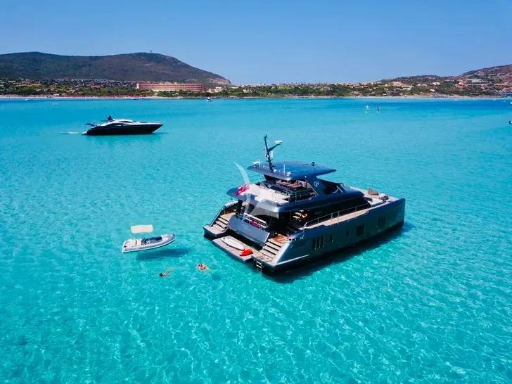 DOUBLE HAPPINESS Sunreef 60 Eco Power - Anchored Aft Shot DOUBLE HAPPINESS Sunreef 60 Eco Power - Anchored Aft Shot