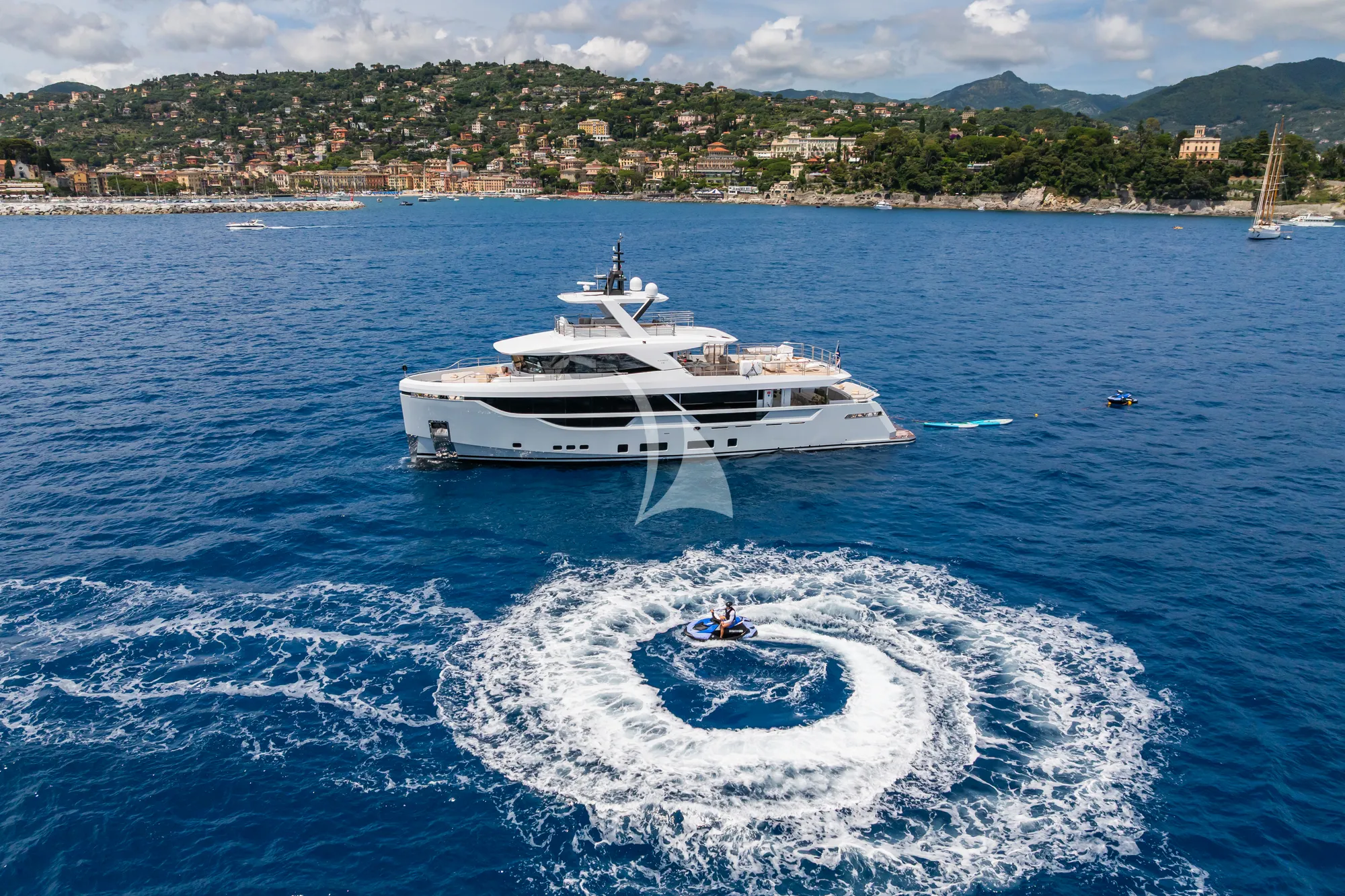 DULCE DE LECHE Blaundus B30 - anchored aerial shot with the jet ski