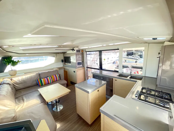 ECSTACY Fountain Pajot Saona 47 - interior saloon and galley ECSTACY Fountain Pajot Saona 47 - interior saloon and galley