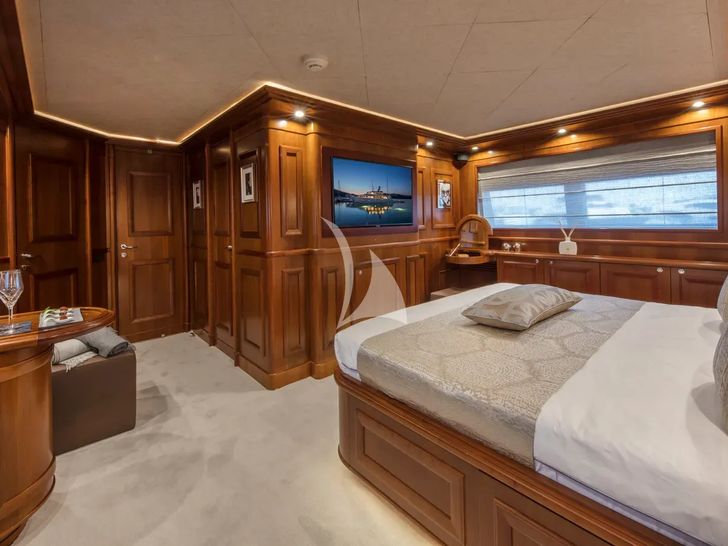 ENA Ferretti Custom Line Navetta 30 - master cabin bed and TV ENA Ferretti Custom Line Navetta 30 - master cabin bed and TV