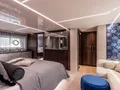 EXIT Sunseeker 90 Ocean - master cabin bed and couch EXIT Sunseeker 90 Ocean - master cabin bed and couch