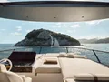 EXPLORA Azimut Fly 82 - flybridge helm and sunbathing area EXPLORA Azimut Fly 82 - flybridge helm and sunbathing area