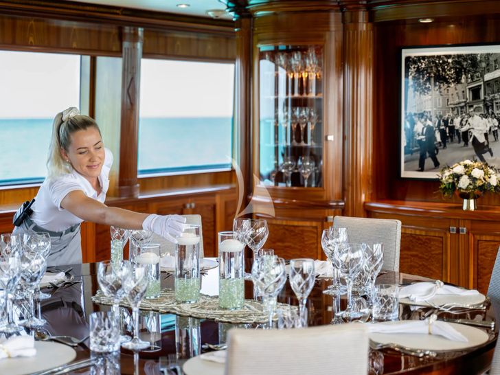 FAR FROM IT Richmond 142 - main deck formal dining set up FAR FROM IT Richmond 142 - main deck formal dining set up