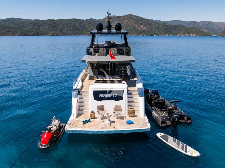 FERRO 77 Delta Marine 25m - anchored aft shot with the water toys FERRO 77 Delta Marine 25m - anchored aft shot with the water toys