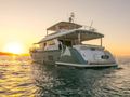 FLOKI Custom 78 Motor Yacht - anchored aft shot under the sunset FLOKI Custom 78 Motor Yacht - anchored aft shot under the sunset