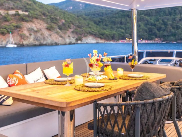FLOKI Custom 78 Motor Yacht - flybridge dining area FLOKI Custom 78 Motor Yacht - flybridge dining area