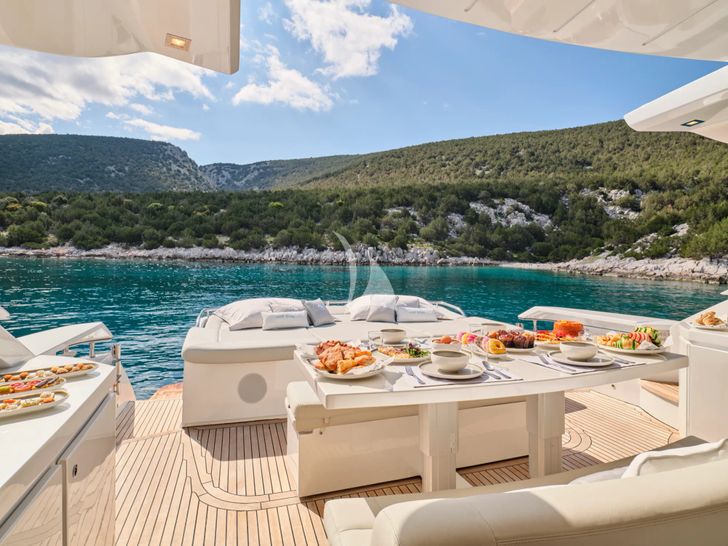 FOR EVER Pershing 80 - aft alfresco dining area and sun bed FOR EVER Pershing 80 - aft alfresco dining area and sun bed