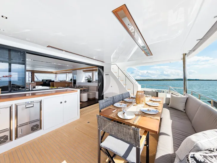 GINGER Iliad 62 - main aft deck alfresco dining lounge GINGER Iliad 62 - main aft deck alfresco dining lounge