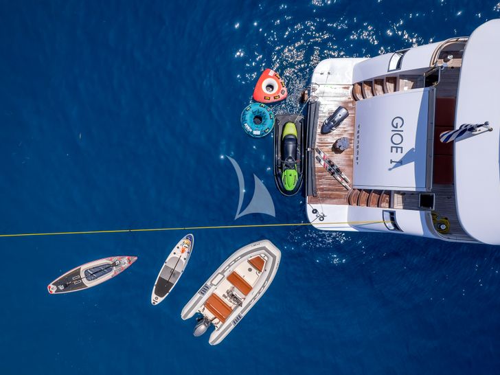 GIOE I Tecnomar 100 aft shot anchored with water toys GIOE I Tecnomar 100 aft shot anchored with water toys