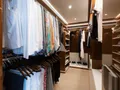 VELOCITY Mangusta GranSport 54 - master cabin walk-in closet VELOCITY Mangusta GranSport 54 - master cabin walk-in closet