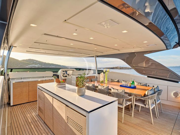 GOLDEN YACHT Sanlorenzo SL106 - flybridge dining area GOLDEN YACHT Sanlorenzo SL106 - flybridge dining area