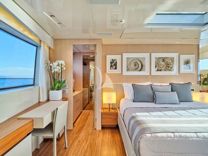 GOLDEN YACHT Sanlorenzo SL106 - master cabin bed and working area GOLDEN YACHT Sanlorenzo SL106 - master cabin bed and working area