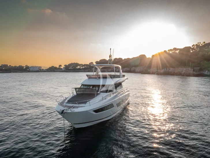GOOD TIMES Prestige 680 - anchored under the sunset GOOD TIMES Prestige 680 - anchored under the sunset