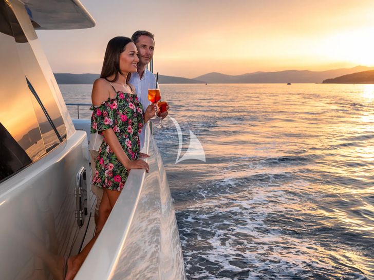 GRACE Aegean Yachts 28m - guests enjoying the sunset GRACE Aegean Yachts 28m - guests enjoying the sunset