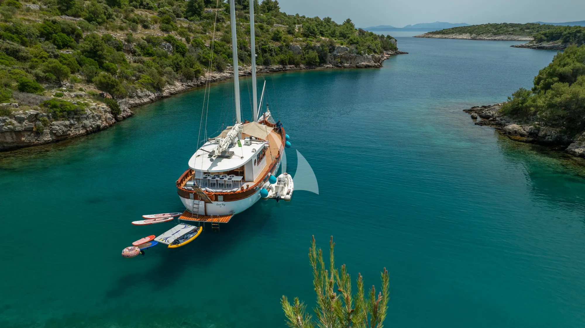 GREEN RAY Custom Gulet 28m - anchored aft shot with the water toys