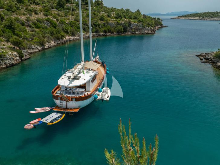 GREEN RAY Custom Gulet 28m - anchored aft shot with the water toys GREEN RAY Custom Gulet 28m - anchored aft shot with the water toys