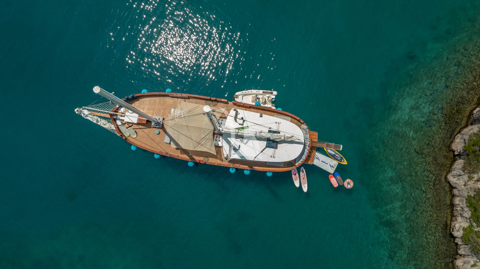 GREEN RAY Custom Gulet 28m - top aerial shot anchored with the water toys